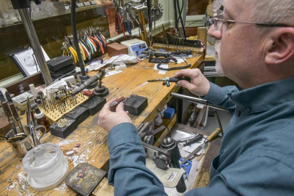 Andrew Russakoff at the jewellers bench